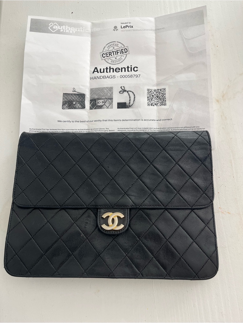 CHANEL Black Quilted Lambskin Clutch with Gold CC